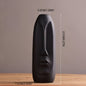 Abstract Long Face Ceramic Vase